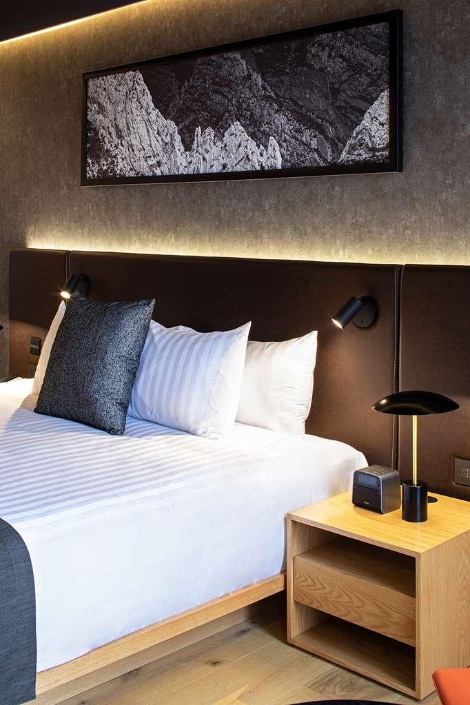 Galeria Plaza Monterrey Hotell Rom bilde A bed at the hotel